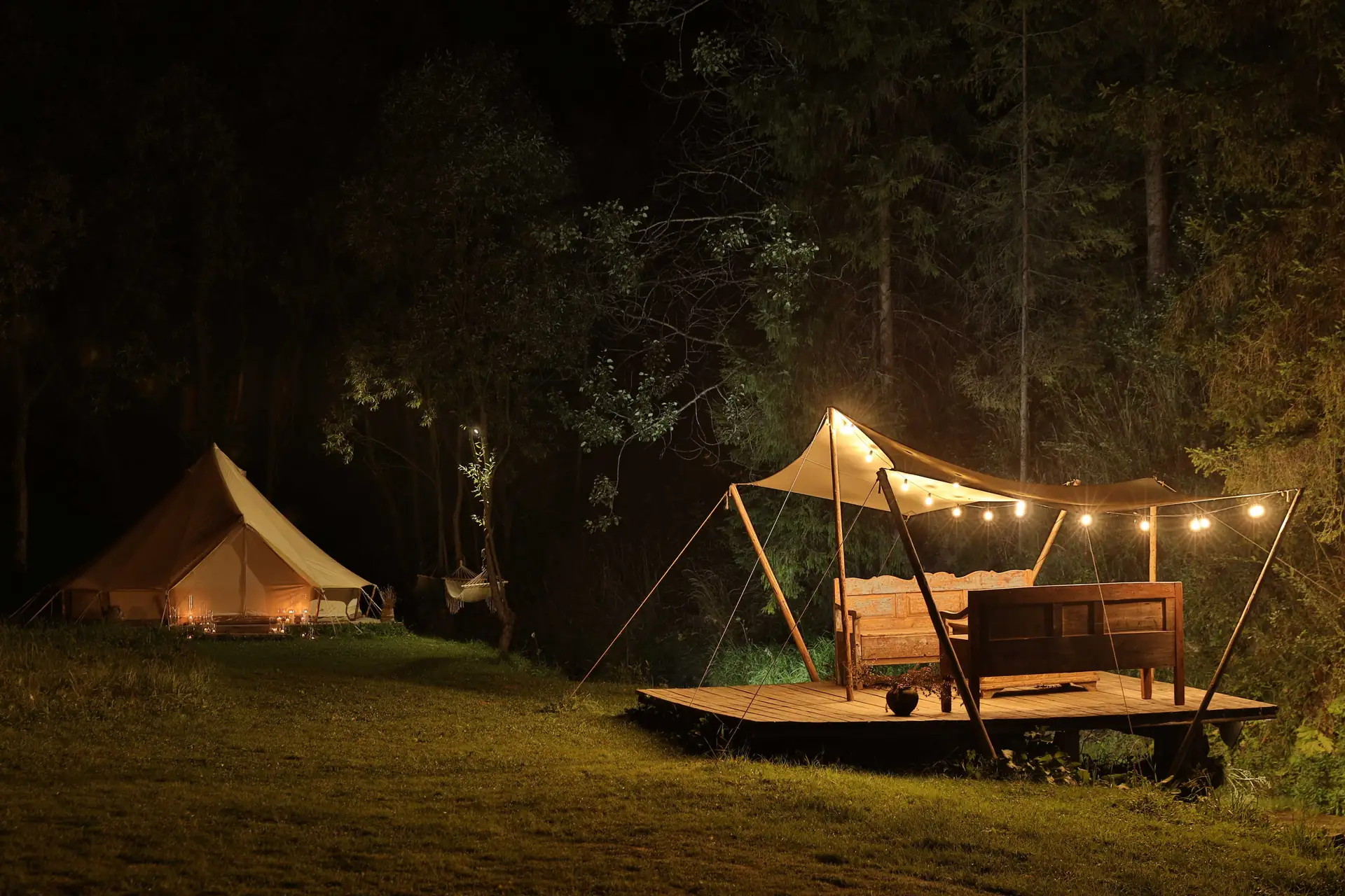 Tents pitched under a starry sky