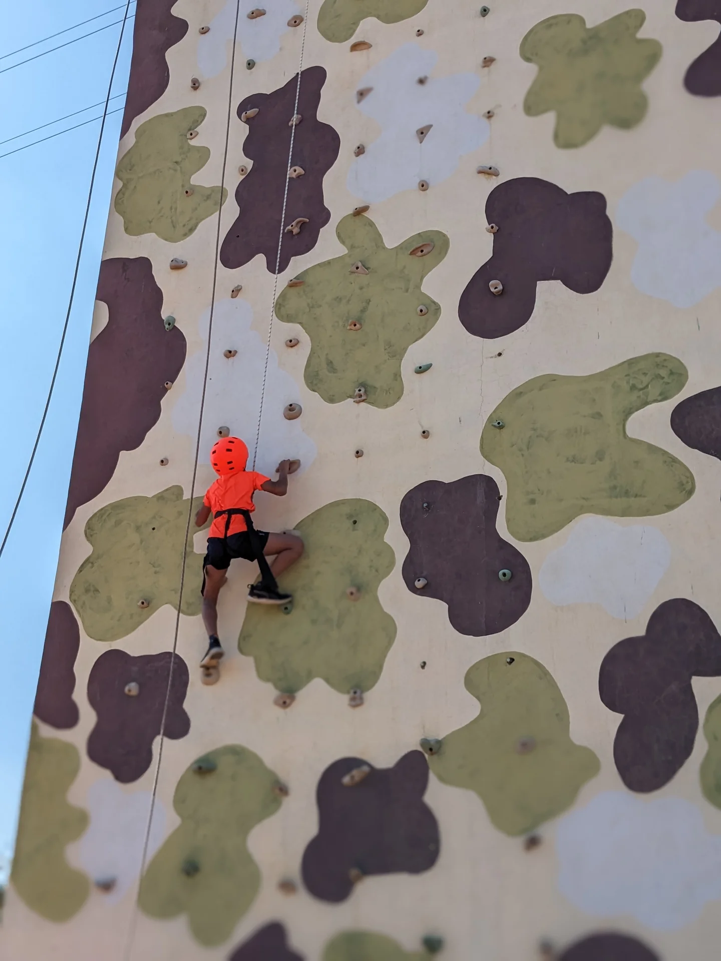 Climber on a rock-climbing wall
